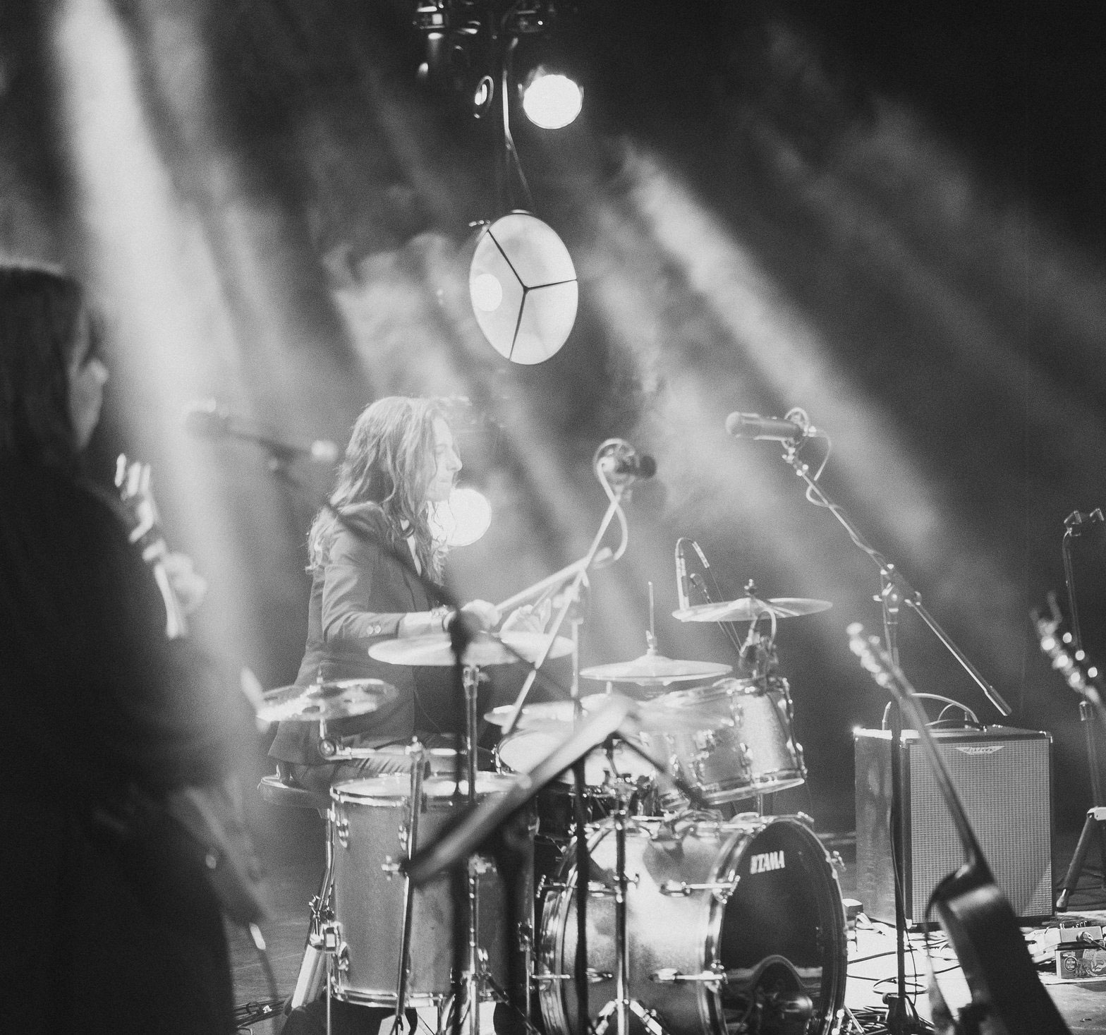 Black and white stage frame, dramatic lighting, Gail at the kit
