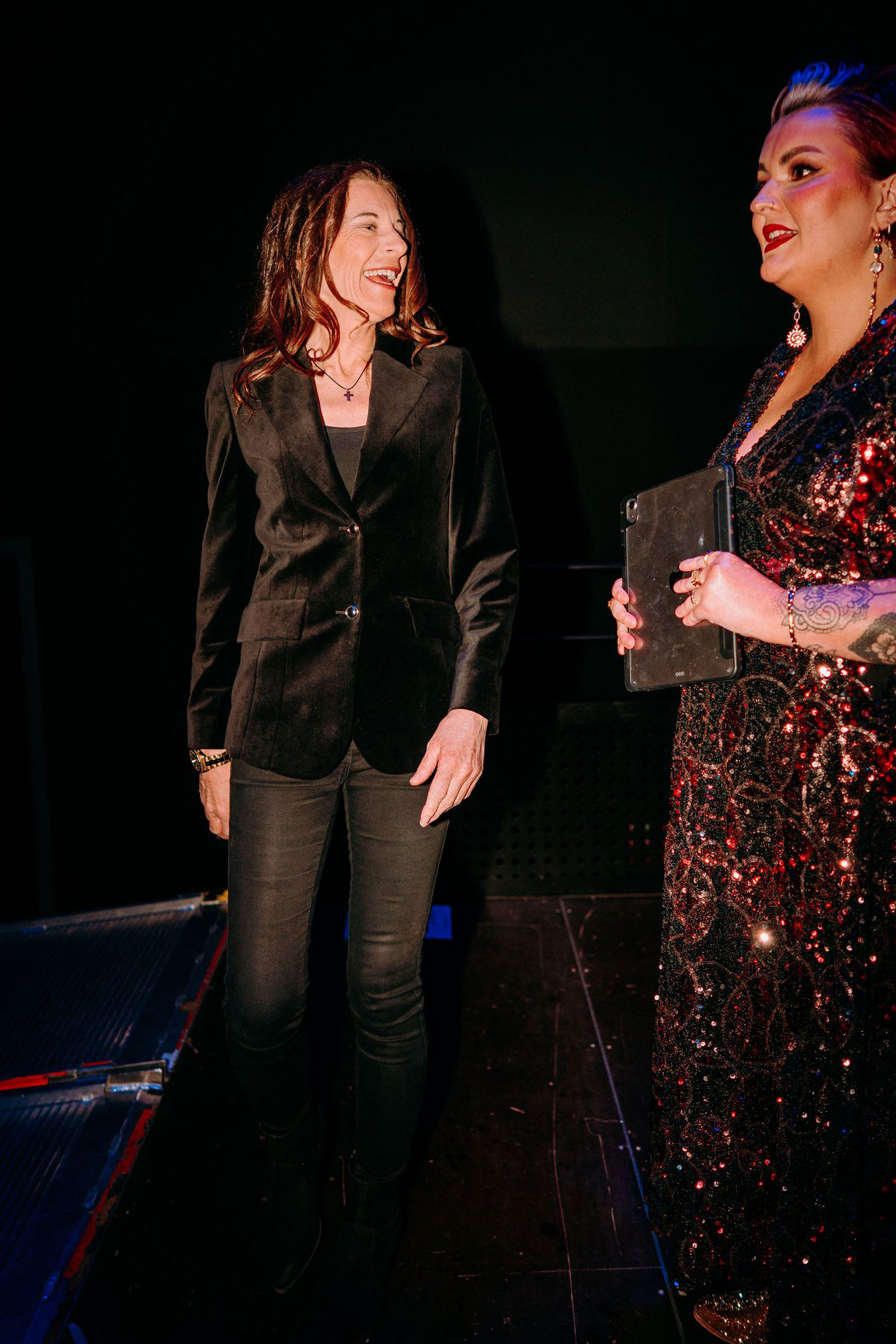 Gail James backstage, talking with Bronwen Lewis